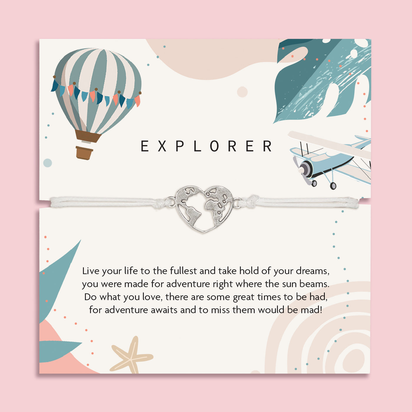 Letterbox Love 'Explorer' travel-themed bracelet – silver heart world map charm on a white cord, displayed on an adventure-inspired card with a hot air balloon, airplane, and uplifting message. Perfect gift for travellers, backpackers, graduates or anyone chasing their dreams. A thoughtful letterbox gift for wanderlust and new journeys.