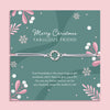 Merry Christmas Fabulous Friend bracelet featuring a silver wreath charm on an adjustable cord, presented on a festive card with snowflakes, mistletoe, and holiday designs. Includes a white soft pouch for gifting and safekeeping. Perfect Christmas jewellery gift for a best friend, Secret Santa present, or stocking filler. A thoughtful and meaningful festive keepsake, ideal for celebrating friendship and spreading holiday cheer during the Christmas season.