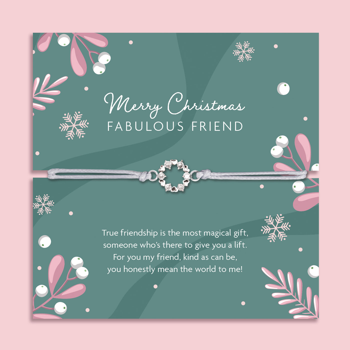 Merry Christmas Fabulous Friend bracelet featuring a silver wreath charm on an adjustable cord, presented on a festive card with snowflakes, mistletoe, and holiday designs. Includes a white soft pouch for gifting and safekeeping. Perfect Christmas jewellery gift for a best friend, Secret Santa present, or stocking filler. A thoughtful and meaningful festive keepsake, ideal for celebrating friendship and spreading holiday cheer during the Christmas season.