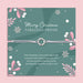 Merry Christmas Fabulous Friend bracelet featuring a silver wreath charm on an adjustable cord, presented on a festive card with snowflakes, mistletoe, and holiday designs. Includes a white soft pouch for gifting and safekeeping. Perfect Christmas jewellery gift for a best friend, Secret Santa present, or stocking filler. A thoughtful and meaningful festive keepsake, ideal for celebrating friendship and spreading holiday cheer during the Christmas season.