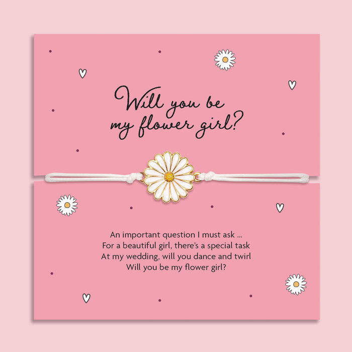 Card with a daisy bracelet and text asking if you will be the flower girl on a pink background. An affordable gift to ask someone to be your flower girl