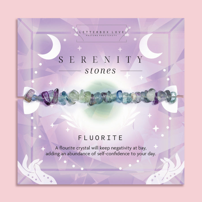 Fluorite crystal chip bracelet on a soft purple Serenity Stones card by Letterbox Love. Handmade healing crystal bracelet for negativity protection and self-confidence. Features natural fluorite gemstones in shades of green, blue, and purple. A thoughtful spiritual gift for her, perfect for mindfulness and wellbeing.