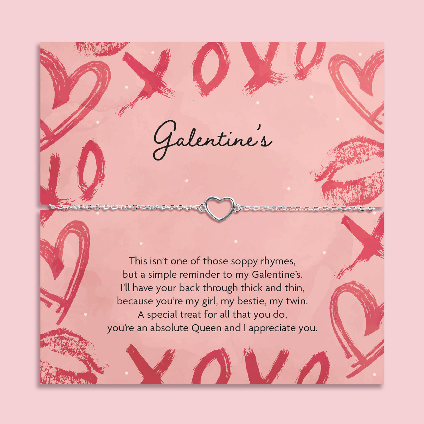 Silver heart chain bracelet on a Galentine’s Day message card with pink kiss print design and friendship poem, celebrating best friends and female friendship.