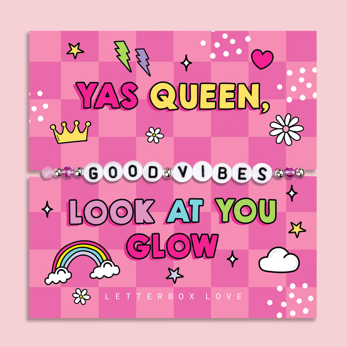 Pink chequered poem card with the bold text saying "Look at you Glow", with a beaded bracelet spelling the words "Good Vibes". An ideal gift for a best friend.