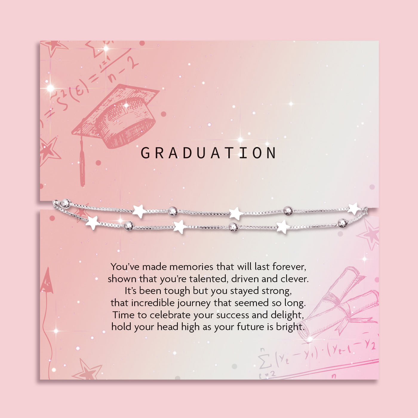 Graduation-themed card with a silver-plated double chain bracelet featuring star and bead charms. The pink and white card design includes a graduation cap and diploma illustrations, with an uplifting poem celebrating academic success. The bracelet is displayed across the front of the card, perfect as a thoughtful graduation gift.