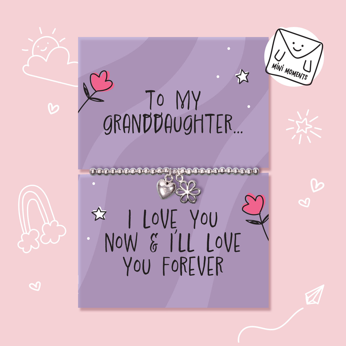 A silver charm bracelet displayed on two lavender gift cards with handwritten-style text and cute doodles, set against a light pink background. One card reads 'To MY GRANDDAUGHTER.