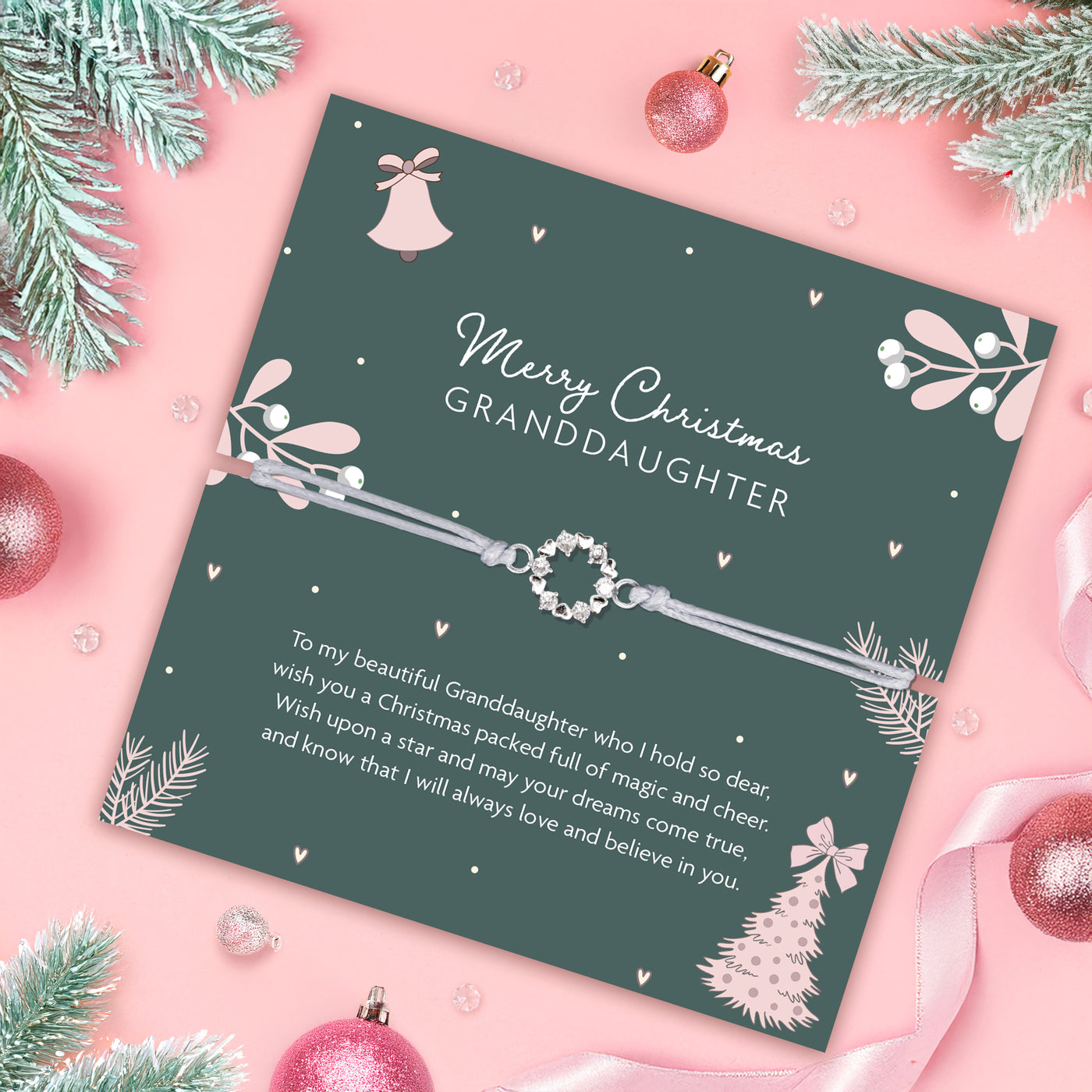Christmas poem card for granddaughter with decorative elements on a pink background, with a festive wreath friendship bracelet.