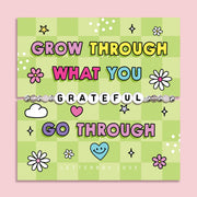 Green chequered poem card with the bold text saying "Grow through what you go through", with a beaded bracelet spelling the word "Grateful". An ideal gift for a best friend.