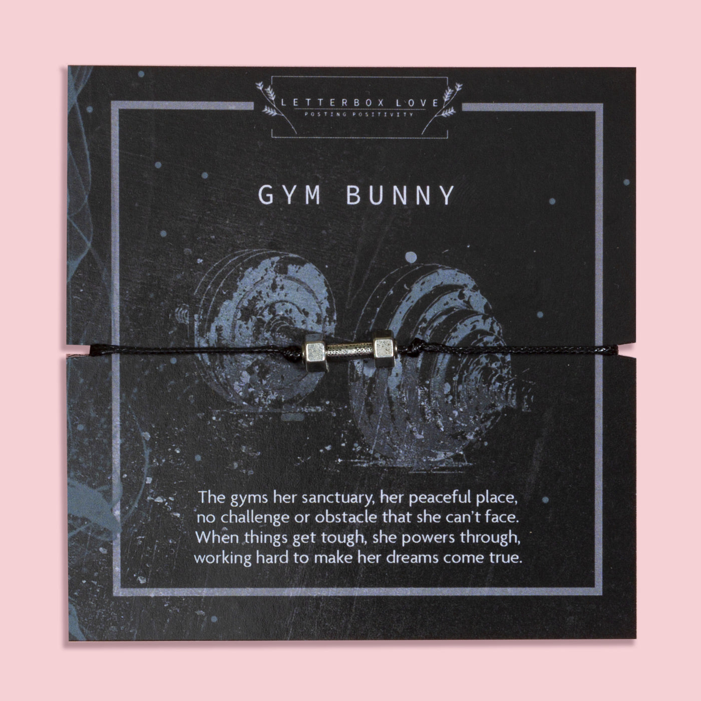 Gym Bunny bracelet featuring a silver-tone dumbbell charm on a black adjustable cord, displayed on a motivational gym-themed card with the message about strength, resilience, and powering through challenges. This fitness bracelet is the perfect gift for gym lovers, workout enthusiasts, personal trainers, and women who love weightlifting or staying active. A unique piece of fitness jewellery and an inspiring keepsake for birthdays, Christmas, or everyday motivation.