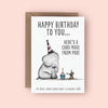Happy Birthday card featuring an elephant and a mouse. The elephant, Letty, is wearing a party hat and looking at a cupcake with a lit candle, held by the mouse, Pinky, who is also in a party hat. The card reads, 