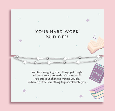 A well done gift to celebrate how hard they worked in exams. The poem card is a pale blue with purple book details. The gift is a beautiful silver-plated star bracelet.