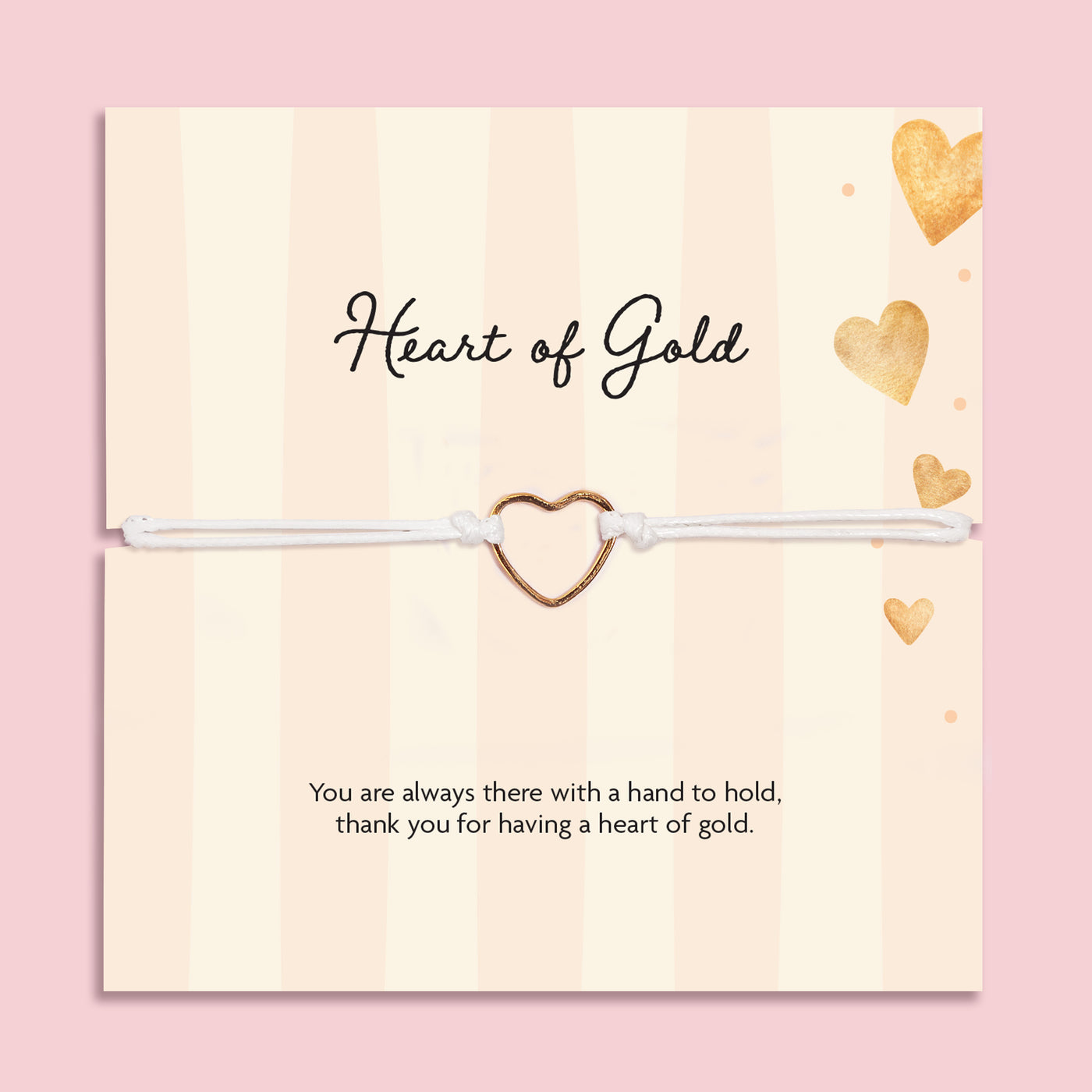 Heart of Gold adjustable white cord bracelet with gold-tone open heart charm displayed on a cream and gold sentiment card reading “Thank you for having a heart of gold.”