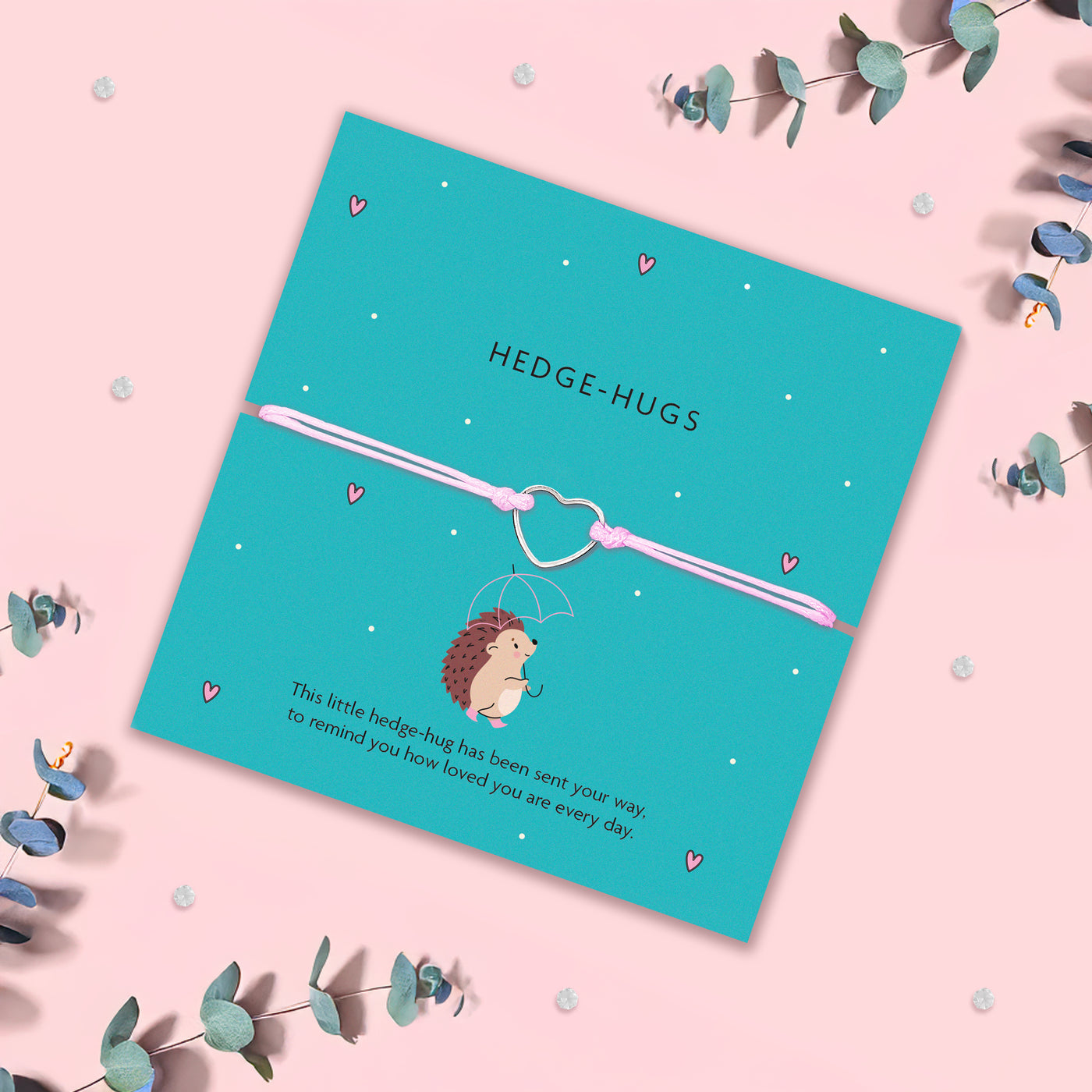 A turquoise greeting card with the title 