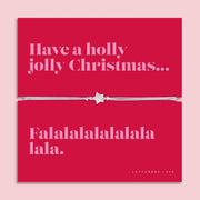 Holly Jolly Christmas star bracelet featuring a sparkling cubic zirconia star charm on an adjustable cord, presented on a bold red Christmas card with the message “Have a holly jolly Christmas… Falalalalalalala.” Arrives beautifully gift wrapped for Christmas gifting. A fun and thoughtful Christmas jewellery gift, perfect as a stocking filler, Secret Santa present.