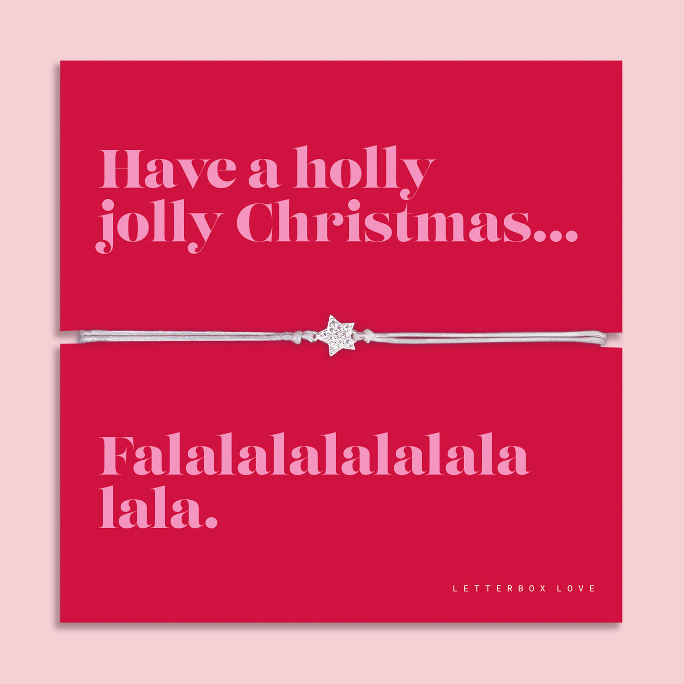 Holly Jolly Christmas star bracelet featuring a sparkling cubic zirconia star charm on an adjustable cord, presented on a bold red Christmas card with the message “Have a holly jolly Christmas… Falalalalalalala.” Arrives beautifully gift wrapped for Christmas gifting. A fun and thoughtful Christmas jewellery gift, perfect as a stocking filler, Secret Santa present.
