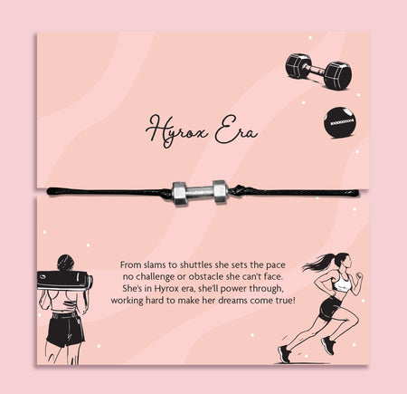Hyrox era bracelet with dumbbell charm on black cord displayed on fitness themed card, gym motivation gift for her
