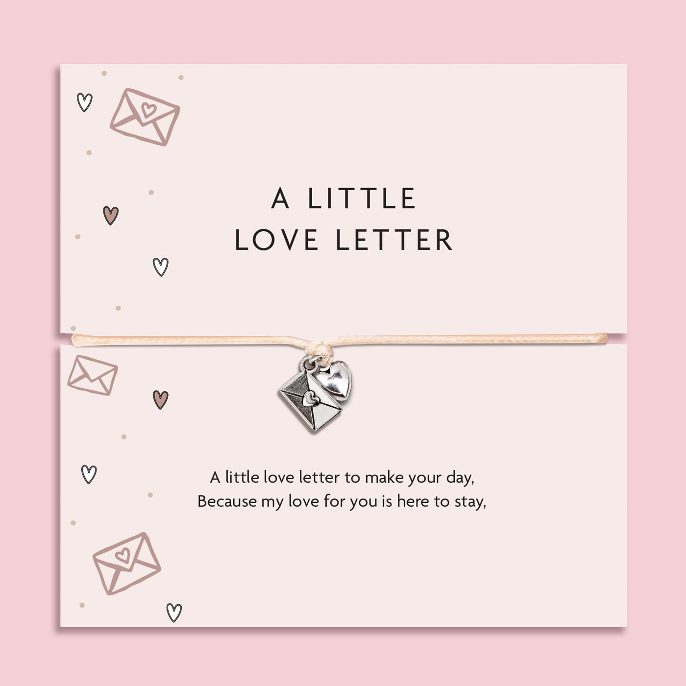 Bracelet with heart charm on a card labeled 'A Little Love Letter' against a pink background. A gift to say 'I love you'