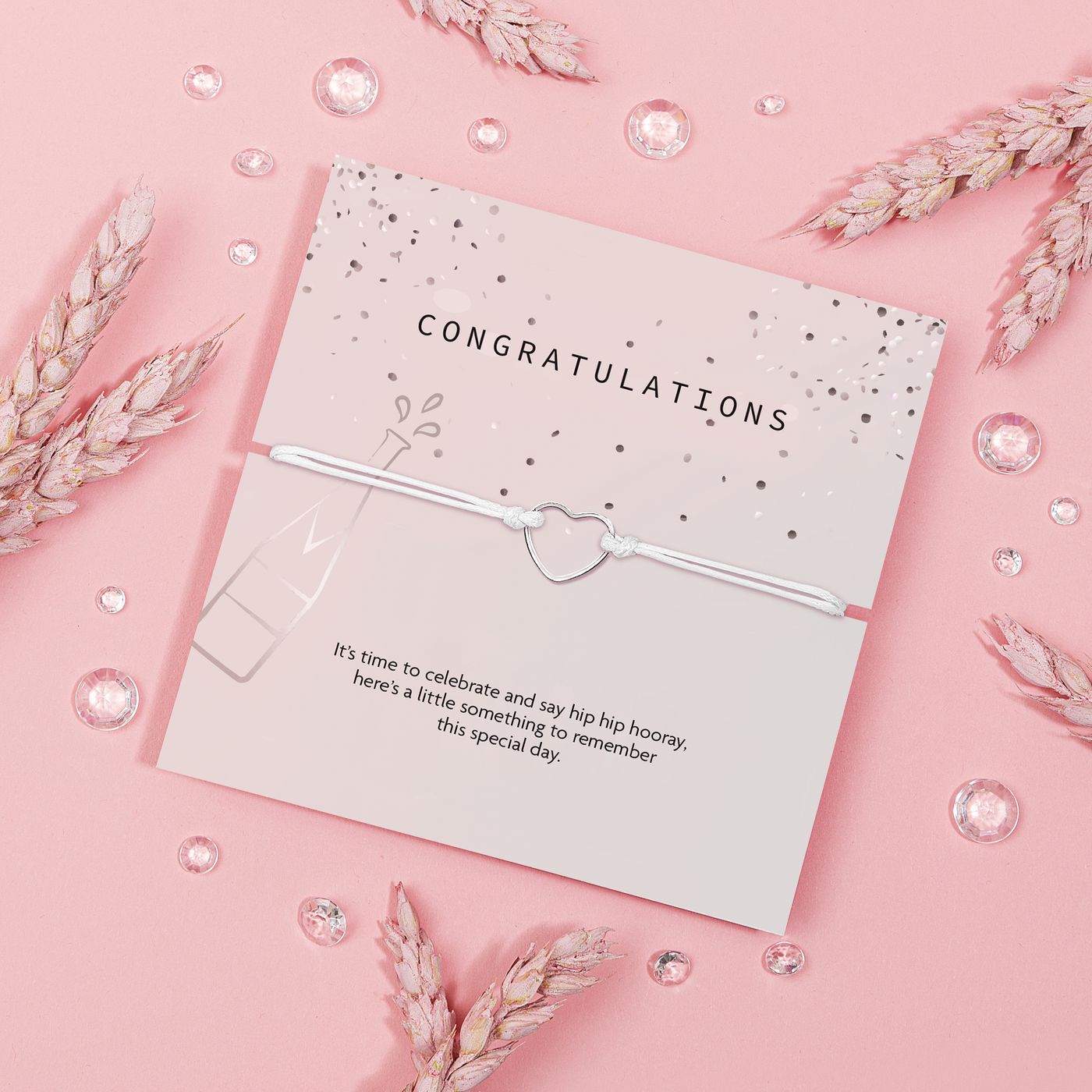 Poem card with 'Congratulations' on a pink background with decorative elements. A friendship bracelet to celebrate a best friend.