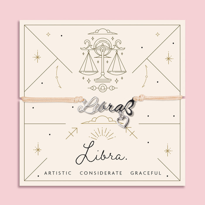 Libra zodiac sign charm on a pink background with decorative text and symbols. Affordable bracelet for a friend. Star sign presents under £20