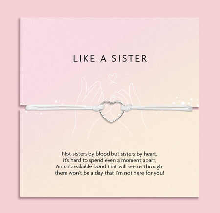 A pale pink background with a 'like a sister' poem card and meaningful message, with a friendship bracelet white string and hollow silver heart