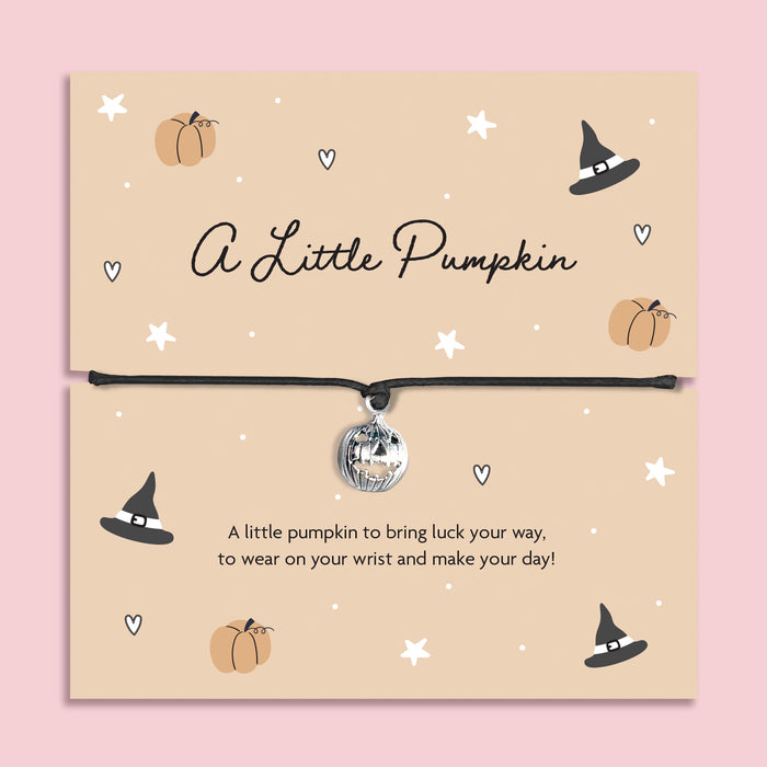 Adorable Halloween pumpkin charm bracelet with adjustable black cord. Perfect spooky-season gift, trick-or-treat surprise, or autumn jewellery for her or kids.