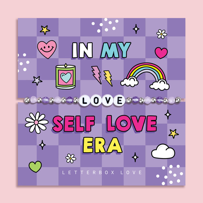 Purple chequered poem card with the bold text saying "In My Self Love Era", with a beaded bracelet spelling the word "Love". An ideal gift for a best friend or a self-love jewellery gift