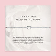 A 'THANK YOU MAID OF HONOUR' appreciation card from Letterbox Love with a pink background. The card displays a heartfelt message of gratitude and features a delicate silver bracelet with a heart-shaped charm. A cute bracelet for a maid of honour.