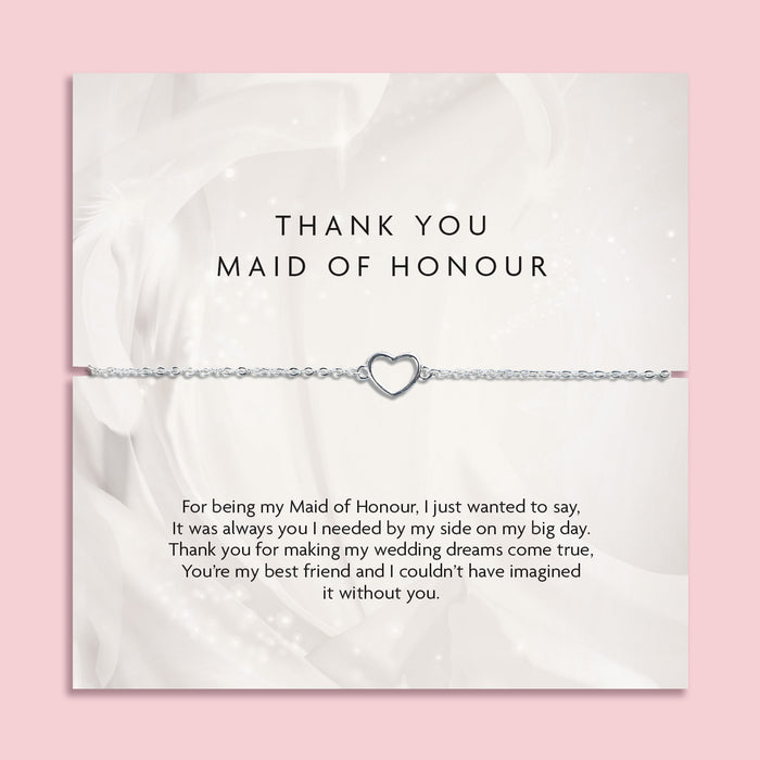 A 'THANK YOU MAID OF HONOUR' appreciation card from Letterbox Love with a pink background. The card displays a heartfelt message of gratitude and features a delicate silver bracelet with a heart-shaped charm. A cute bracelet for a maid of honour.