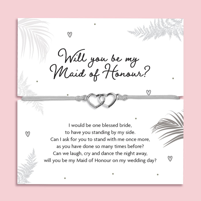 Maid of Honour proposal bracelet with interlocking silver hearts, adjustable cord, and sentimental poem card. Perfect gift for proposal boxes and bridal party keepsakes