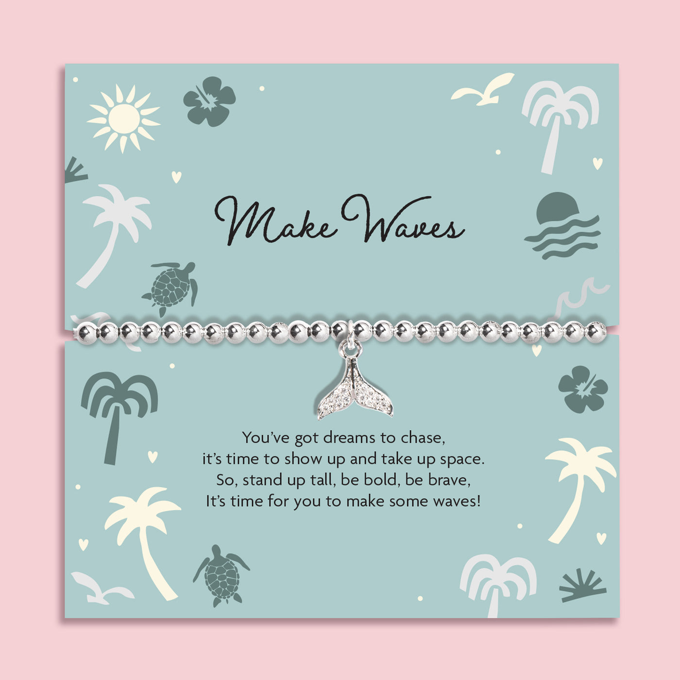 Bracelet with a whale tail charm on a decorative card with ocean-themed illustrations. Holiday silver-plated bracelet.