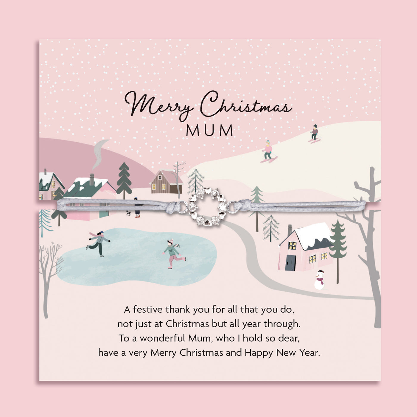Merry Christmas Mum bracelet featuring a silver wreath charm on an adjustable cord, presented on a festive pink card with snowy village scene, skiers, and ice skaters. Includes a soft white pouch for gifting and safekeeping. A thoughtful Christmas jewellery gift for mum, perfect as a stocking filler, Christmas morning surprise, or sentimental keepsake. A meaningful bracelet designed to show love and appreciation this holiday season.