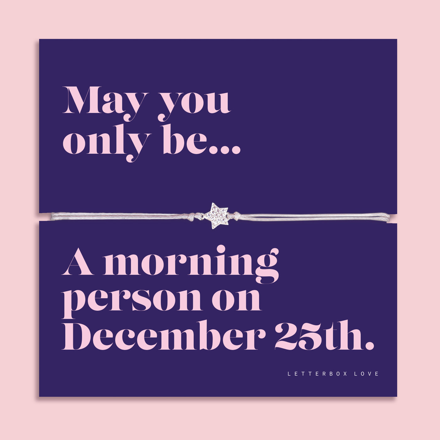 Christmas star bracelet featuring a sparkling cubic zirconia star charm on an adjustable bracelet, presented on a navy Christmas card with the playful message “May you only be a morning person on December 25th.” Includes a soft white pouch for gifting and safekeeping. A fun and thoughtful Christmas jewellery gift.