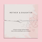 Silver heart-shaped bracelet on a 'Mother & Daughter' themed card with pink background. A silver-plated gift from Daughter to Mother Under £20