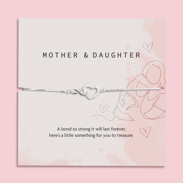 Silver heart-shaped bracelet on a 'Mother & Daughter' themed card with pink background. A silver-plated gift from Daughter to Mother Under £20