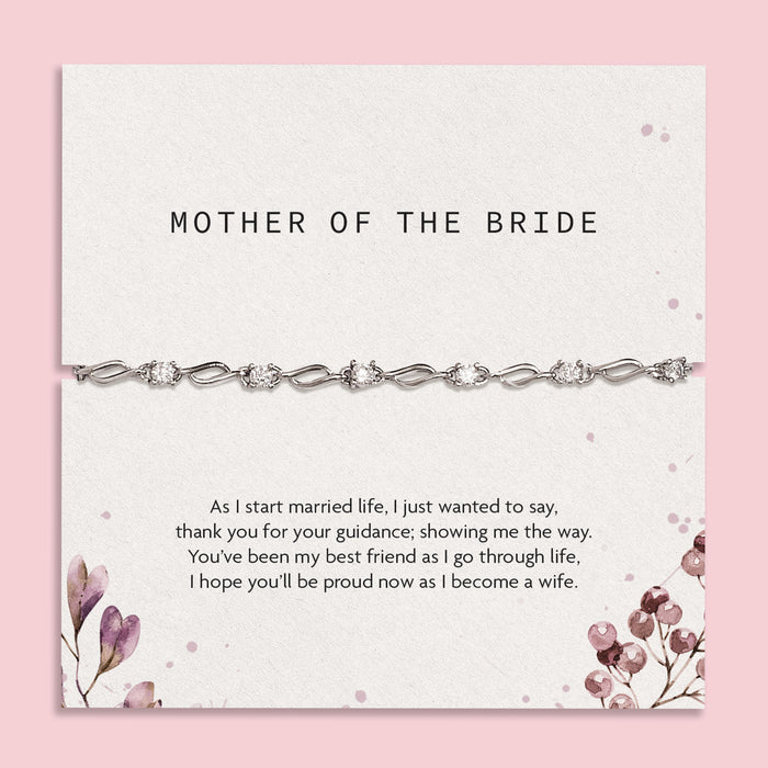 Bracelet on a card with 'Mother of the Bride' text and floral design on a pink background. An elegant silver bracelet for the Mother of the Bride. Wedding gifts.