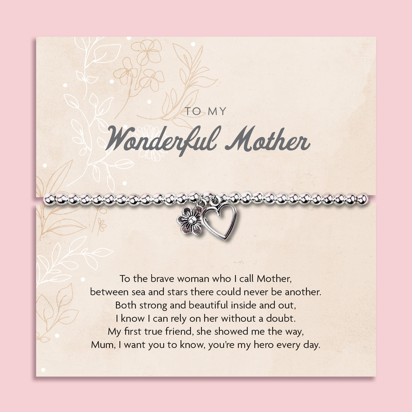 A silver beaded bracelet with a heart and flower charm displayed on a card reading 