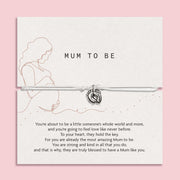 Bracelet with baby feet charm on a card for 'Mum to Be' with text and Letterbox Love branding. A cute bracelet for a Mum to Be