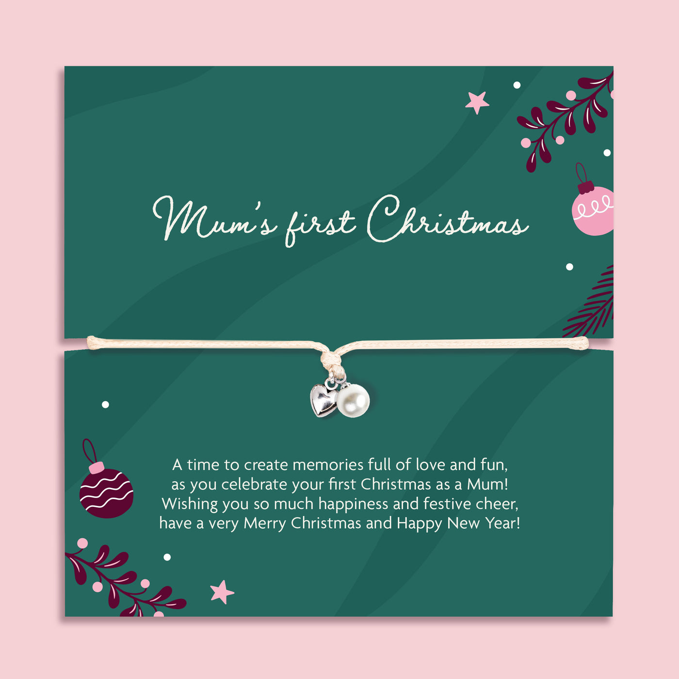 A square poem card with a thin white bracelet across the center and small heart and pearl charms. The card is dark green with white script reading 'Mum's first Christmas' and smaller white text below, decorated with Christmas ornaments, stars, and foliage on a light pink background.