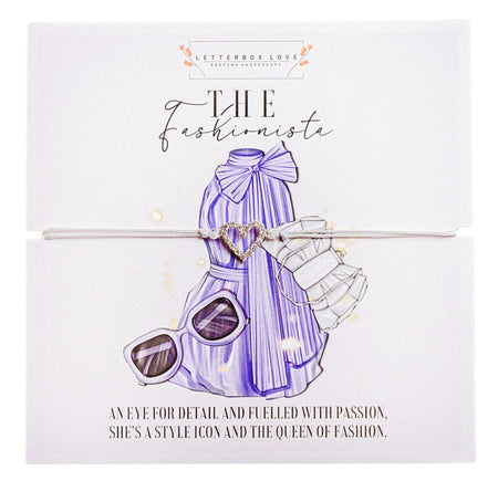 For the Fashionista in the friendship group - 'The Fashionista' with an artistic illustration of a stylish purple dress, a pair of chic sunglasses, and fashion-forward heels. A silver bracelet with a heart-shaped pendant adorns the card, placed against a crisp white background. The accompanying text reads, 'An eye for detail and fuelled with passion, she's a style icon and the queen of fashion.