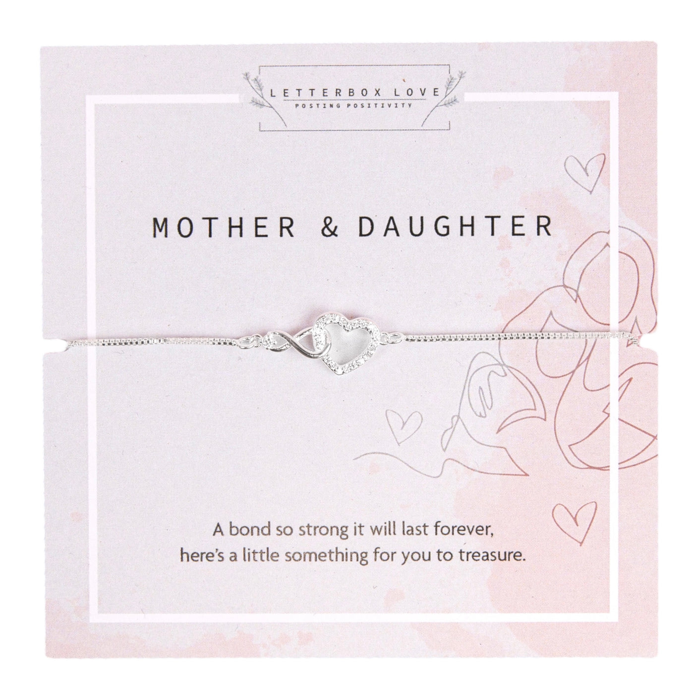 A silver bracelet featuring an intertwined heart and infinity symbol, displayed on a light pink card with the words 