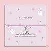 Adjustable pink cord Halloween bracelet with delicate silver ghost pendant, displayed on a pastel card with cute ghost, heart, and cobweb illustrations. Perfect spooky-season jewellery gift, trick-or-treat favour, or Halloween present for adults and older children.