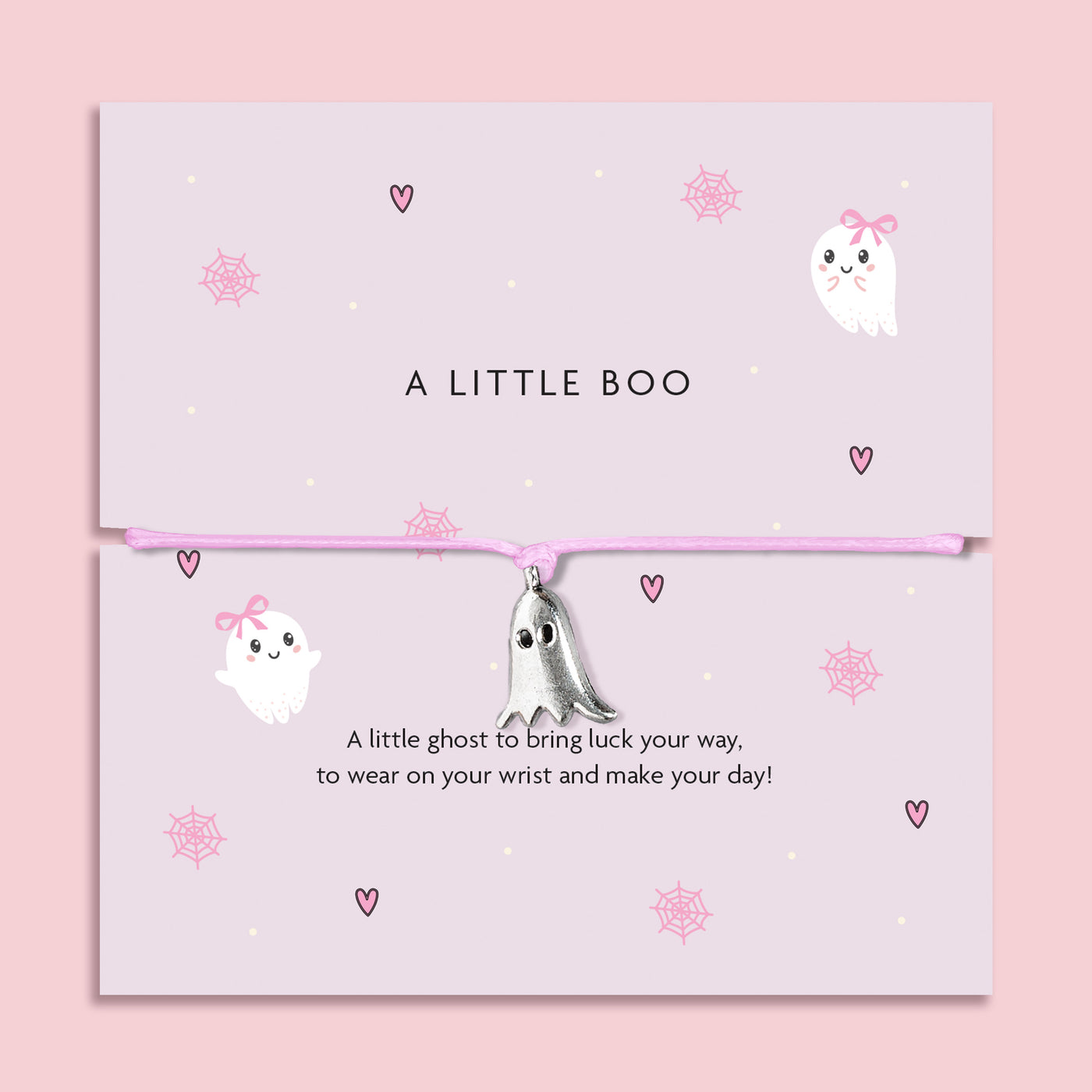 Adjustable pink cord Halloween bracelet with delicate silver ghost pendant, displayed on a pastel card with cute ghost, heart, and cobweb illustrations. Perfect spooky-season jewellery gift, trick-or-treat favour, or Halloween present for adults and older children.