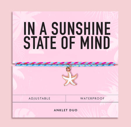 Colourful waterproof anklet duo featuring pink and turquoise woven cords with a white starfish charm on a pink 