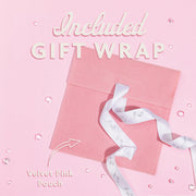 Pink pouch free gift wrapping on a pale pink background