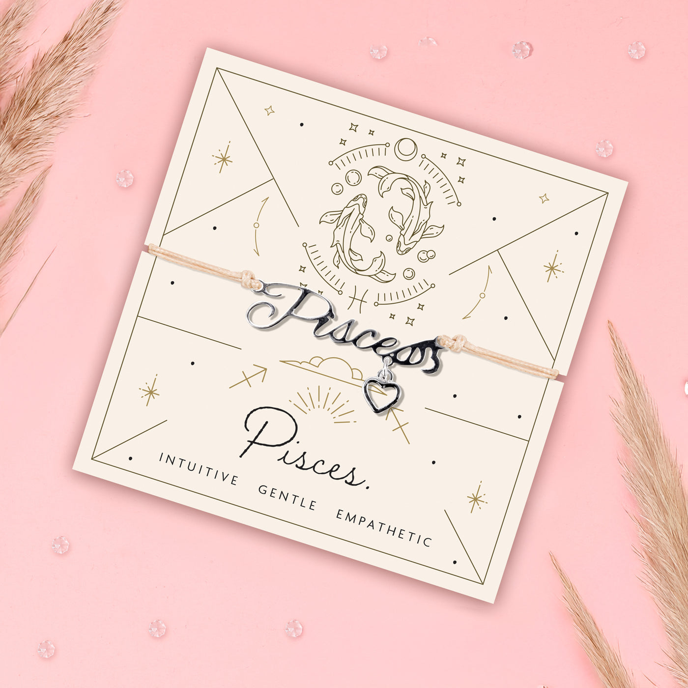 Bracelet with 'Princess Pisces' design on a matching card with decorative elements on a pink background. Star sign jewellery for women