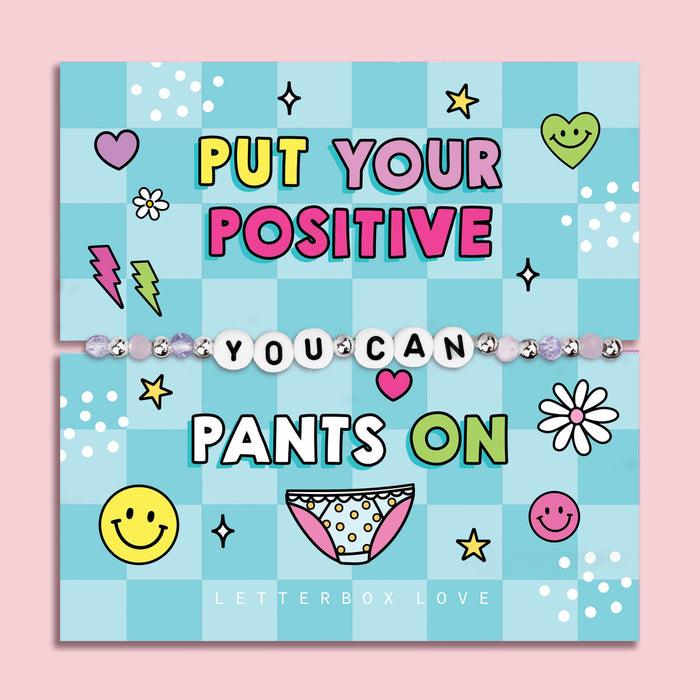 Blue chequered poem card with the bold text saying "Put your positive pants on", with a beaded bracelet spelling the words "You Can". An ideal gift for a best friend.