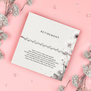 Silver leaf bracelet, a thoughtful gift for retirement. Presented on a 'Retirement' card featuring a heartfelt message celebrating years of hard work and dedication. Perfect for someone retiring, this elegant bracelet symbolizes relaxation, new beginnings, and enjoying life's next chapter.