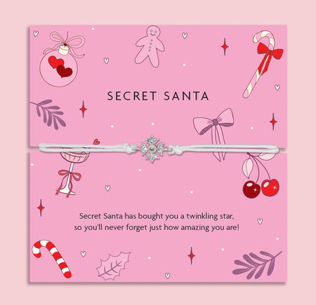 Affordable Secret Santa Gift with a decorative bracelet and festive illustrations on a pink poem card. 