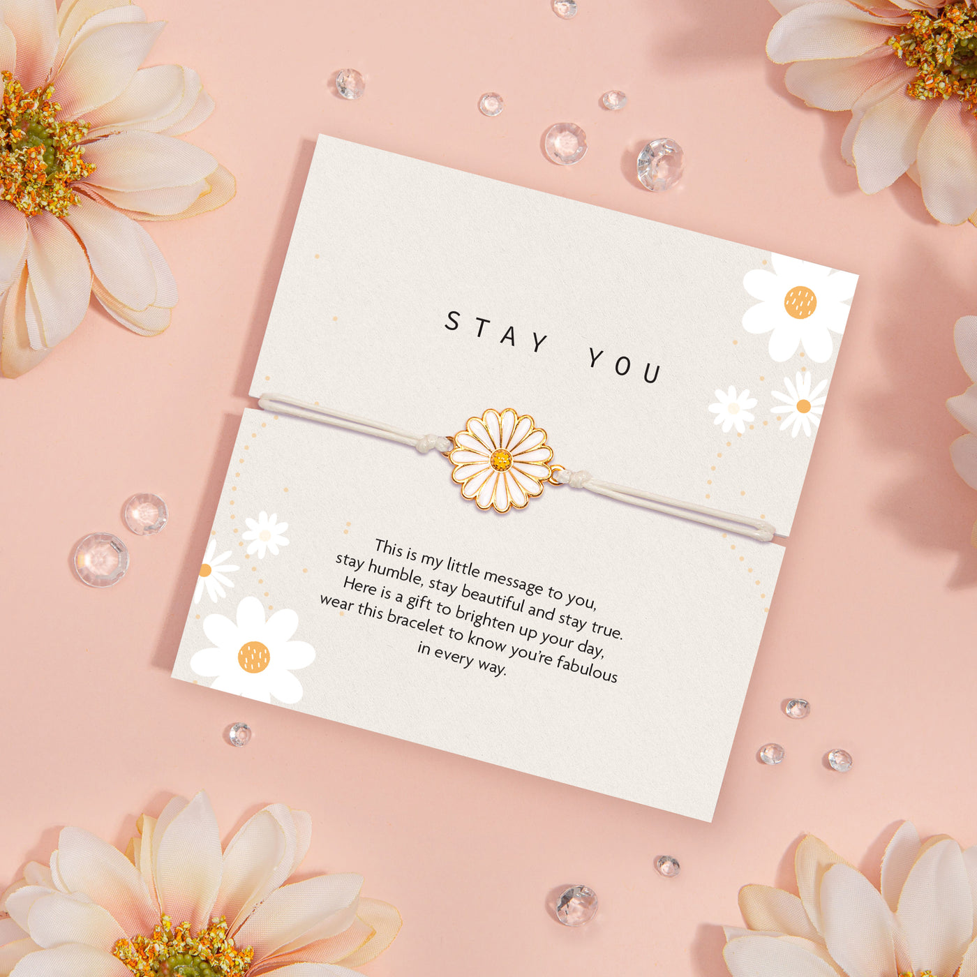 Bracelet with 'Stay You' message on a card surrounded by flowers and decorative elements. A gift under £10 for a best friend