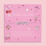 A colourful and fun poem card design that says "strong girls club" with a meaningful poem for a friend. Around the card is a pink cord friendship bracelet with three cute silver-plated bows.
